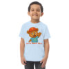 Teddy Tells Light Blue Toddler T-Shirt Front Teddy Tells light blue toddler t-shirt front featuring a friendly teddy bear character